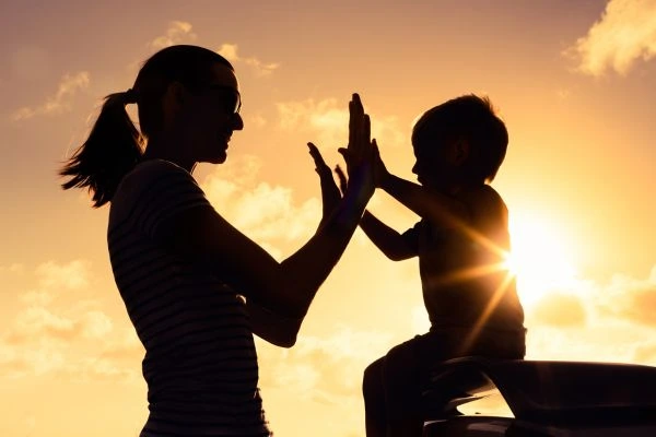 Image of happy mother and child after resolving child arrangements Bradford
